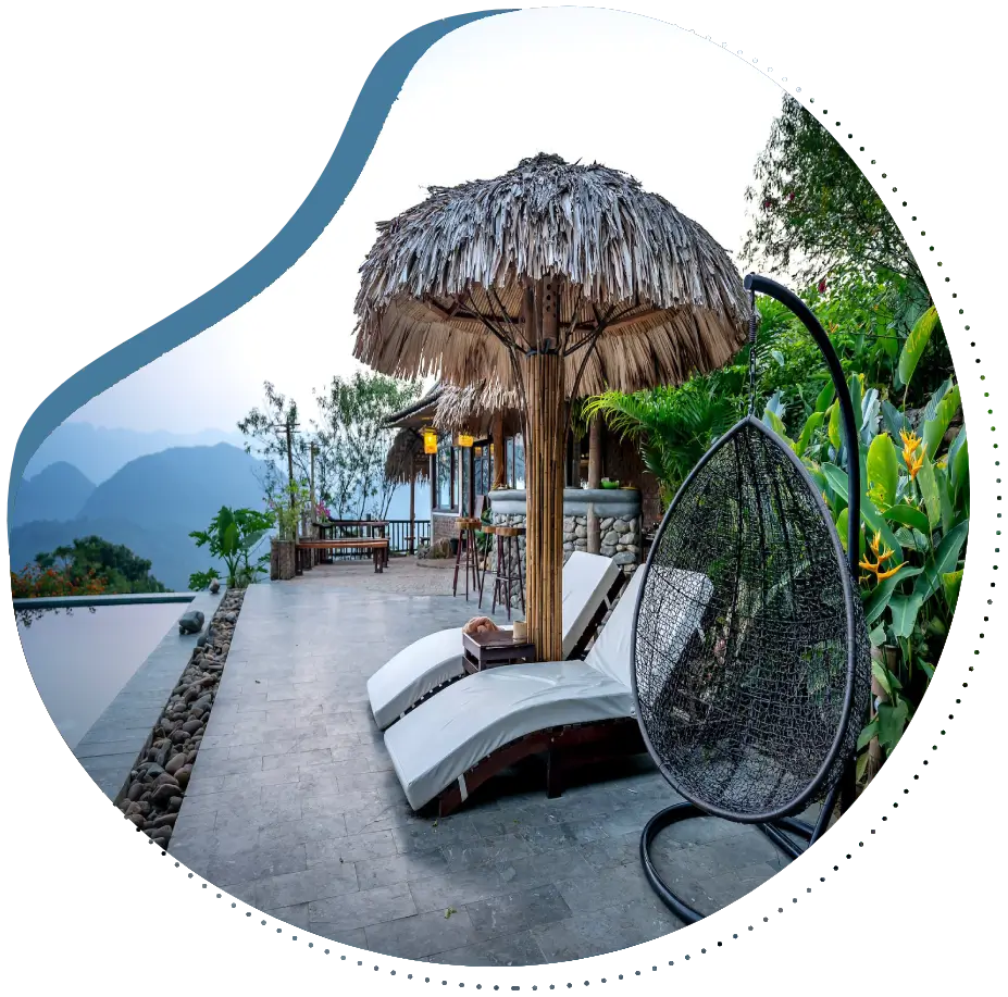 A beach umbrella and lounge chairs on the patio.